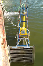 submersible skimmer in water for BP's trials with EVTN